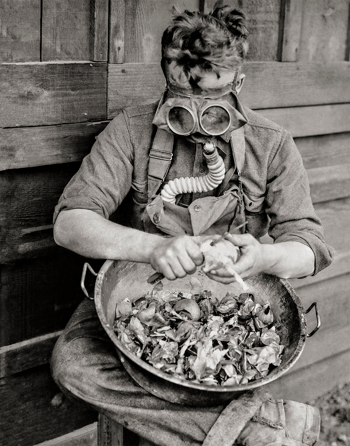Clever soldier uses Gas Mask To Peel Onions, 1917 Historical Pix