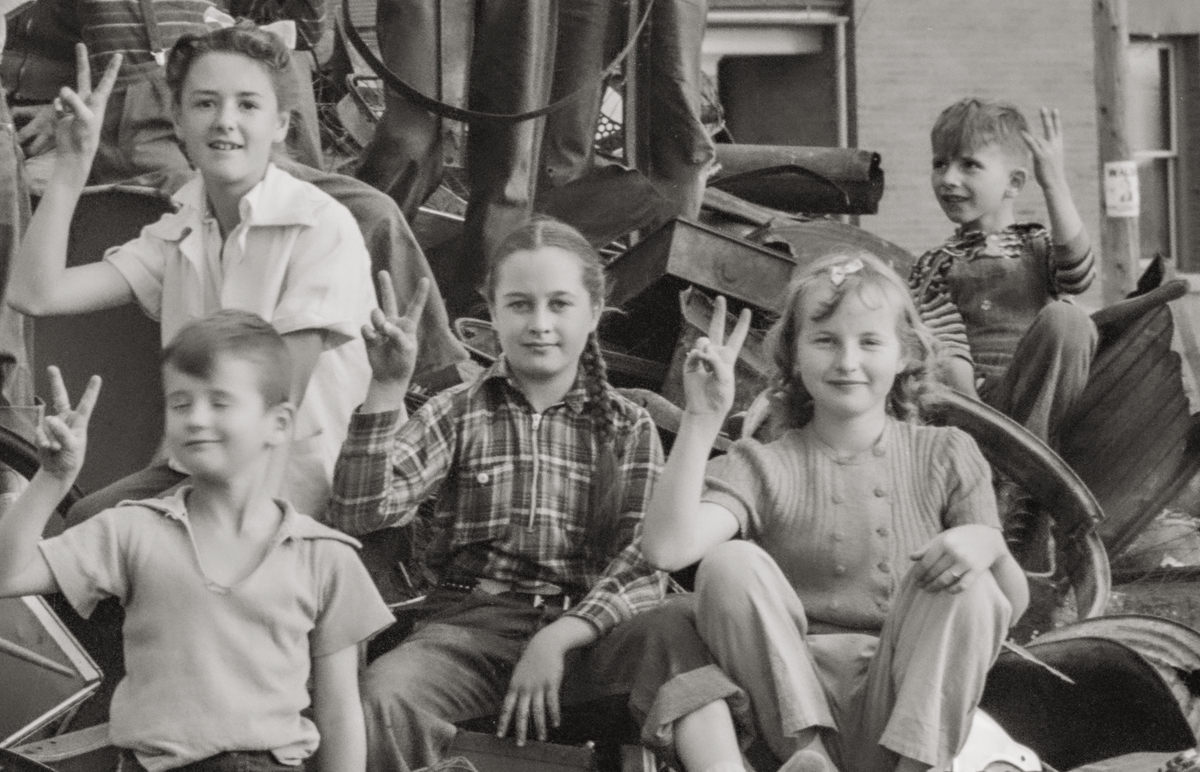 Butte, Montana, Schoolchildren on a Pile of Scrap, 1942, Lee Russell